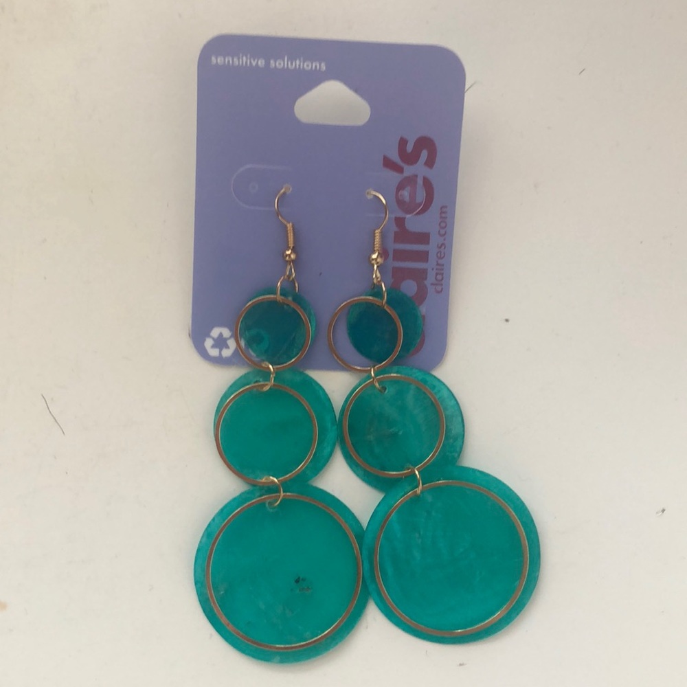 Turquoise green earrings from Claire’s.
